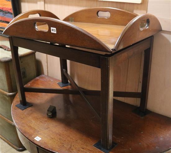 A mahogany butlers tray on a stand W.75cm